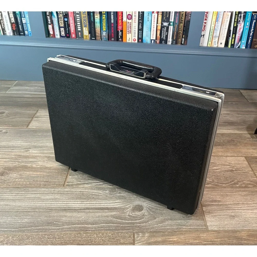Vintage Oshkosh Black Hard Shell Suitcase Briefcase Style Travel Case Since 1895
